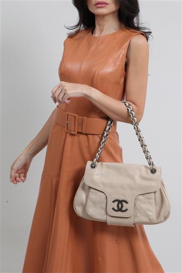 Bolsa Chanel Caviar Coco Rider Flap Bege